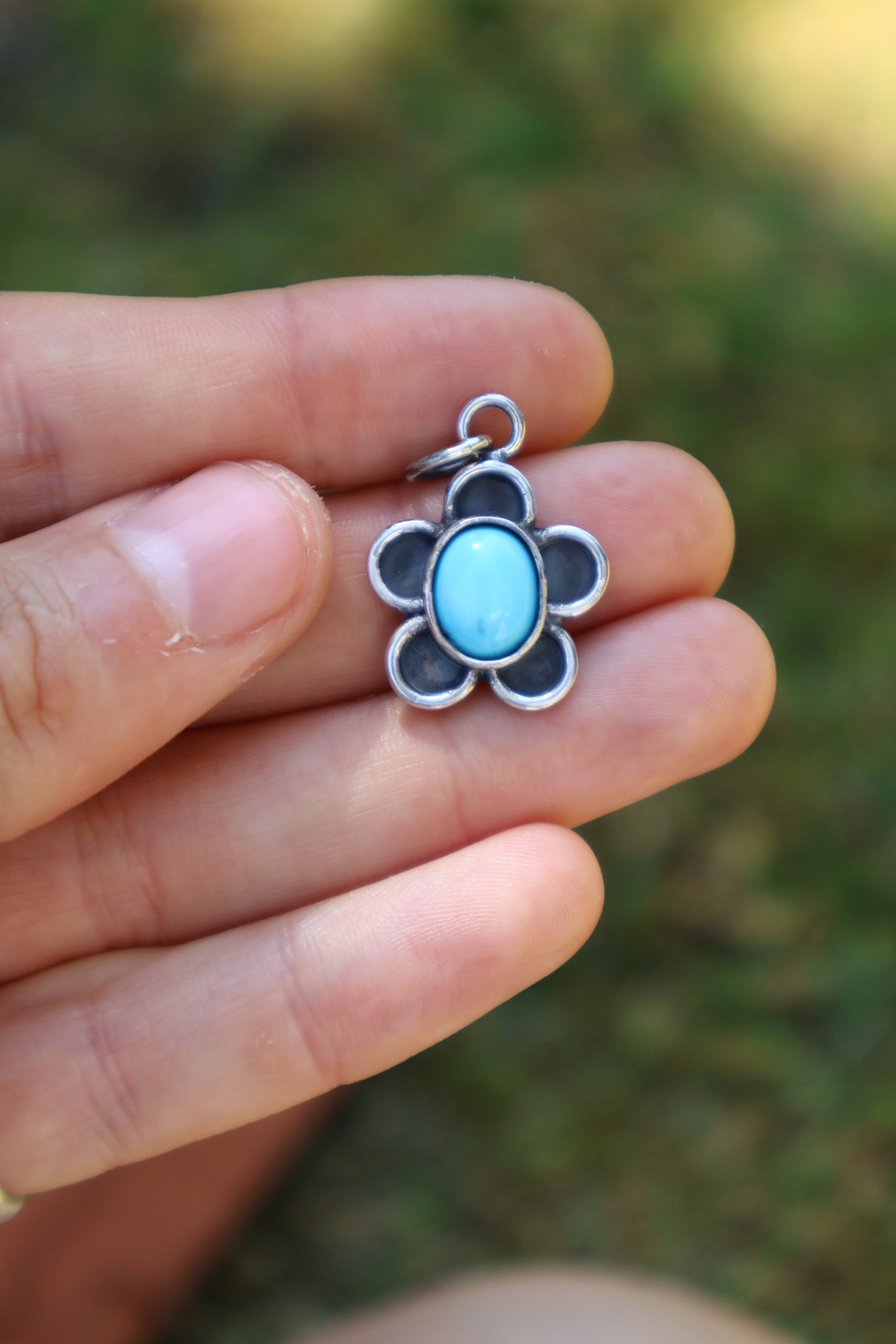 small flower power blue sterling silver pendant