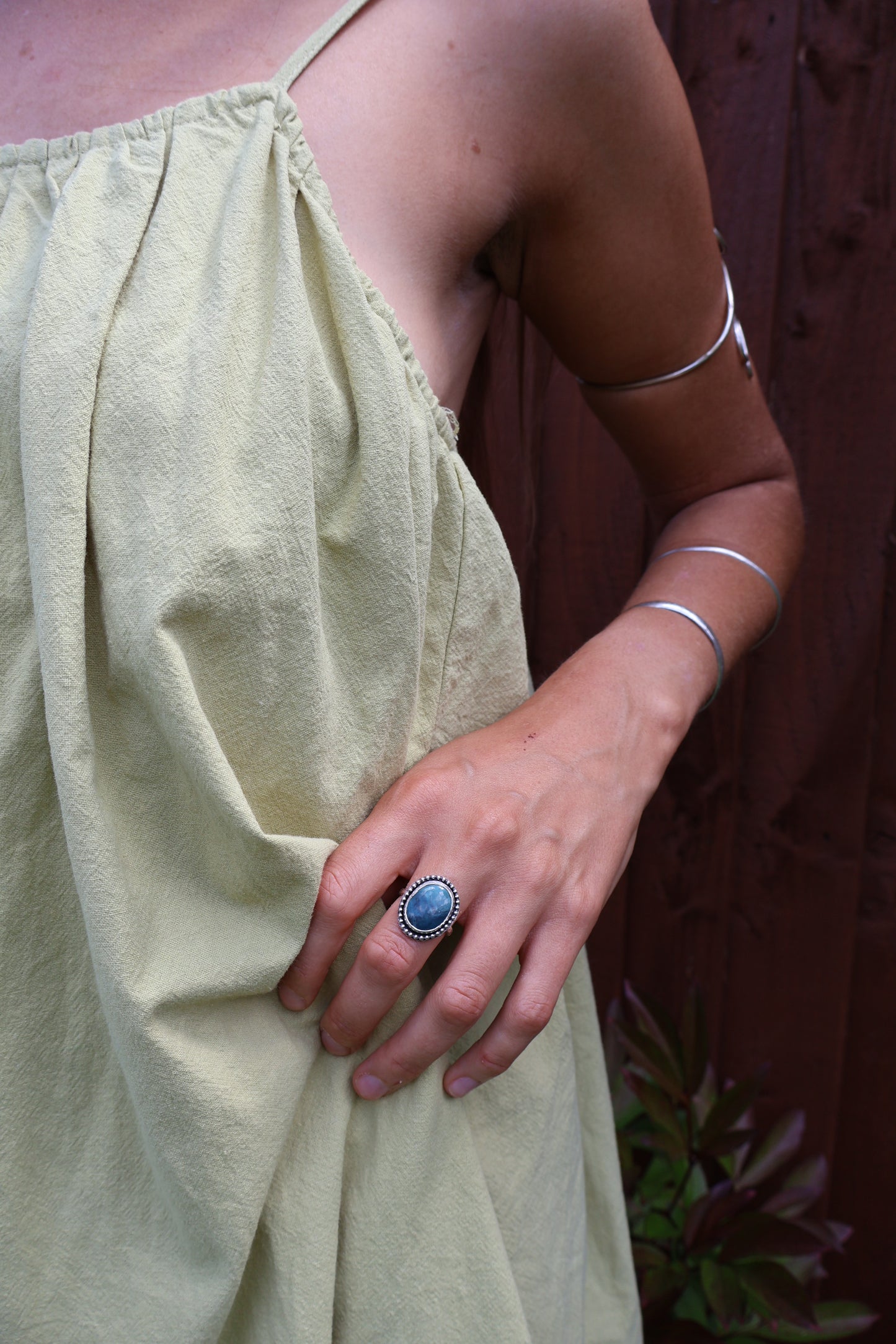 Artisan sterling silver ring with daisy petals and vivid Hubei turquoise