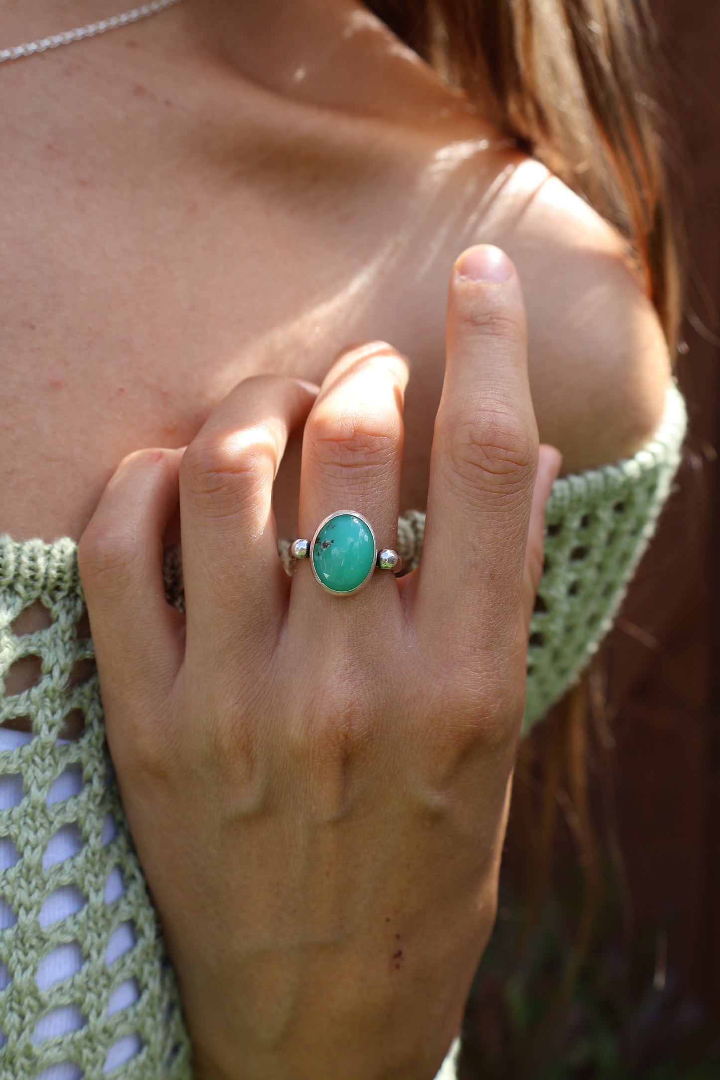 Artisan hammered sterling silver ring with earthy green chrysoprase stone