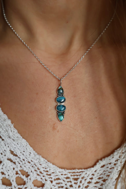 four stone blue pendant