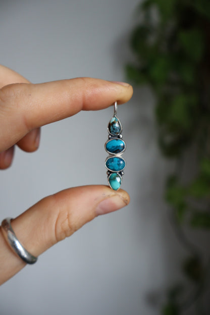 four stone blue pendant