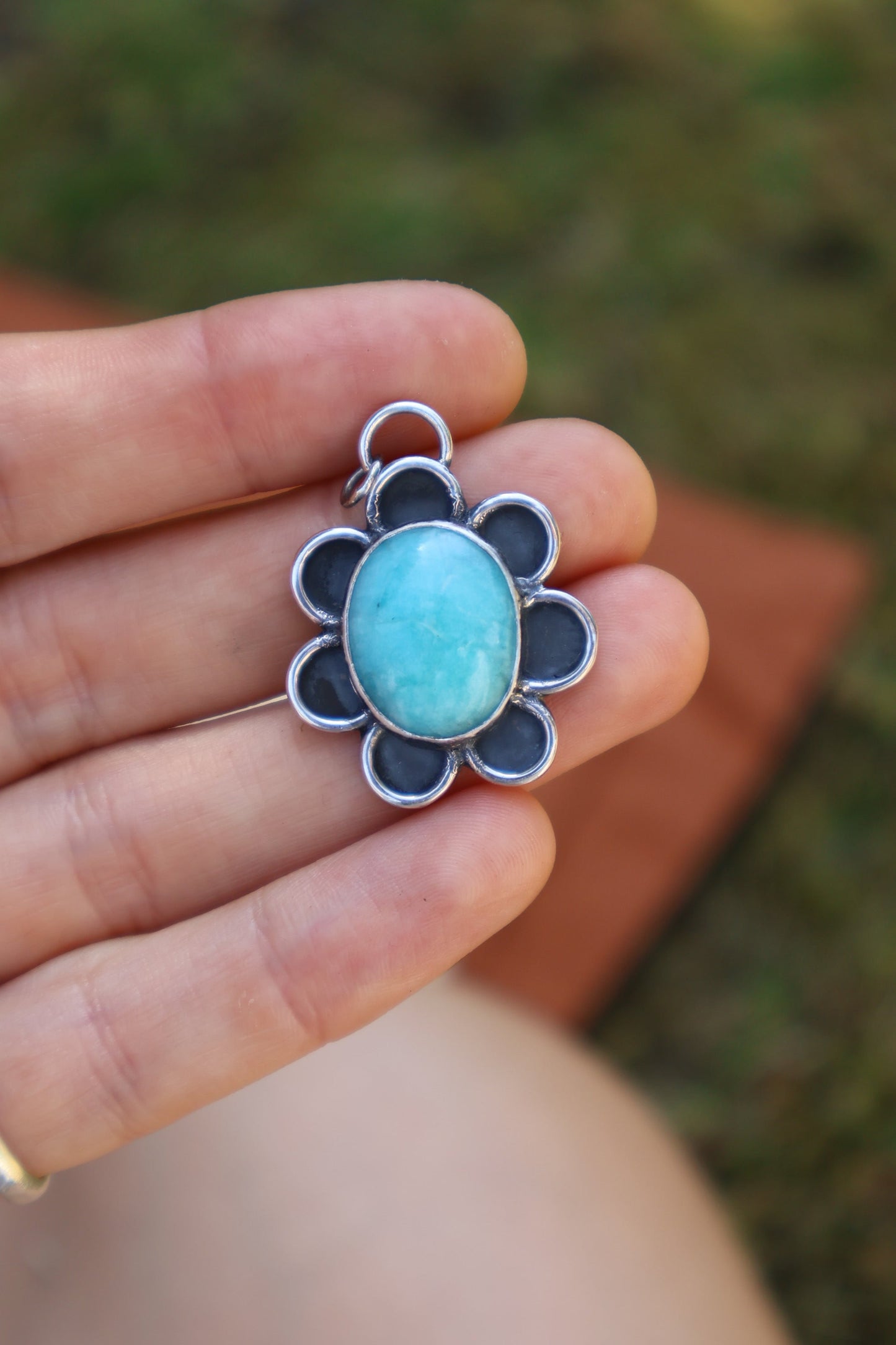 large flower power sterling silver blue pendant