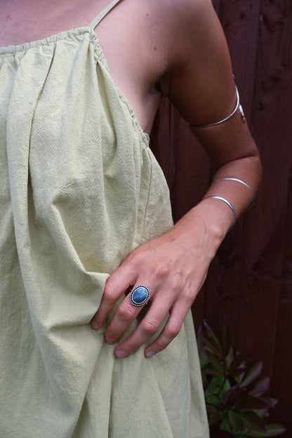 Artisan sterling silver ring with daisy petals and vivid Hubei turquoise
